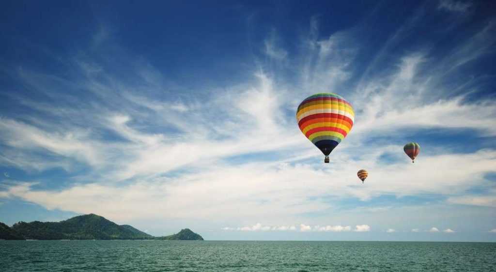 Hot air balloon travel over Andaman sea